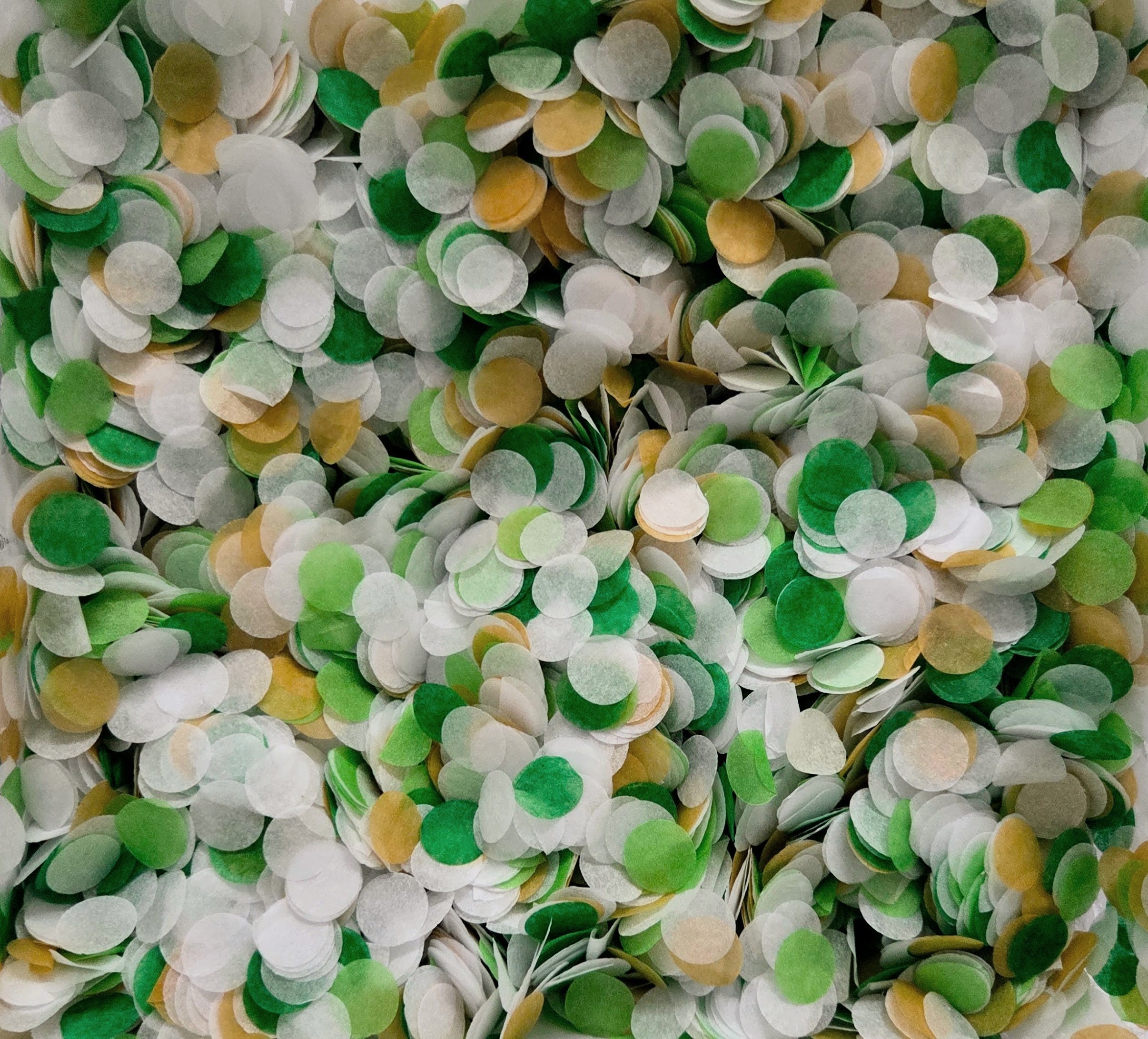 Green, white & Gold confetti circles flat lay