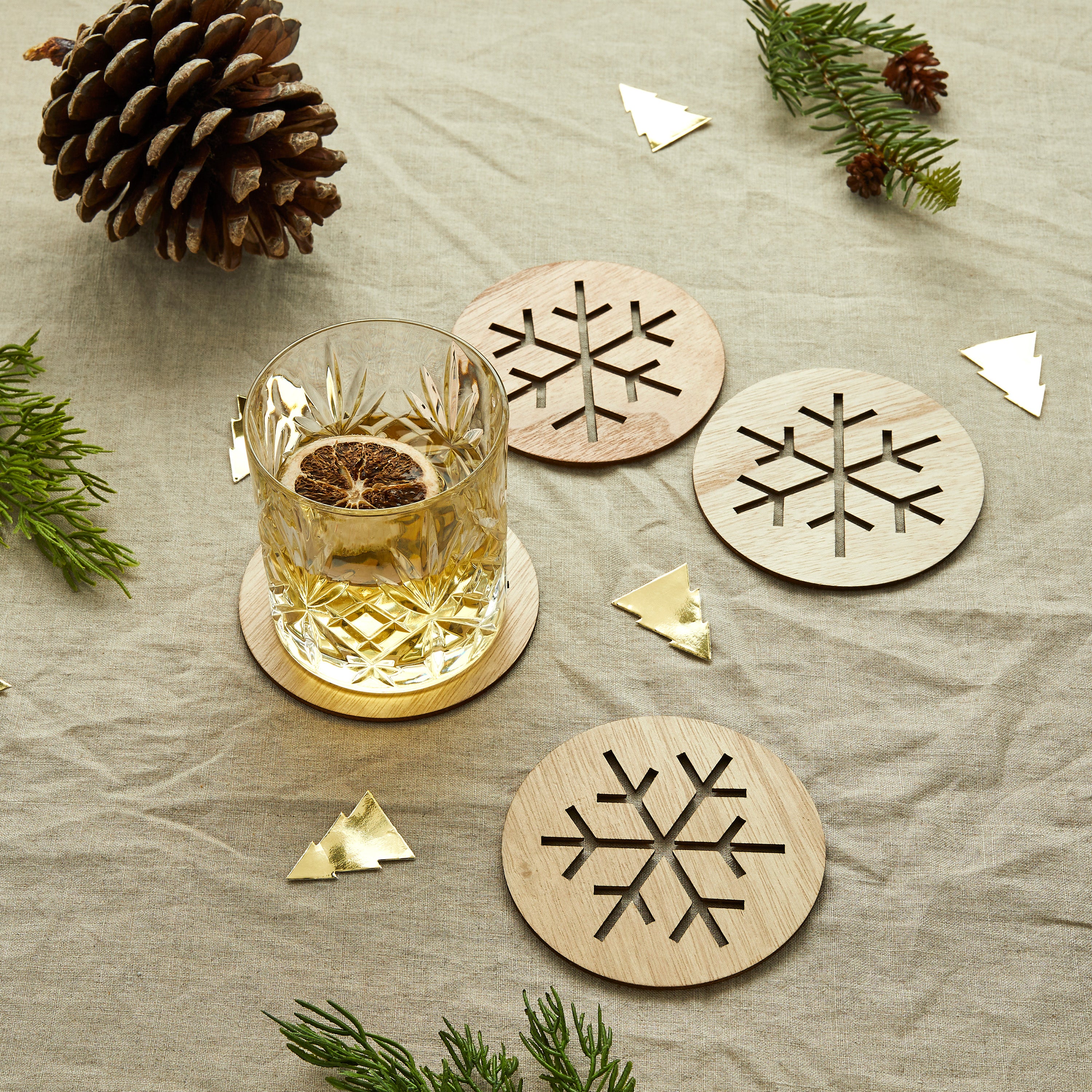 Wooden Christmas Coasters with a snowflake design | Proper Confetti